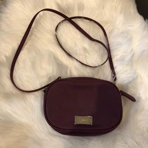Small Purple Crossbody Nine West purse with zipper closure